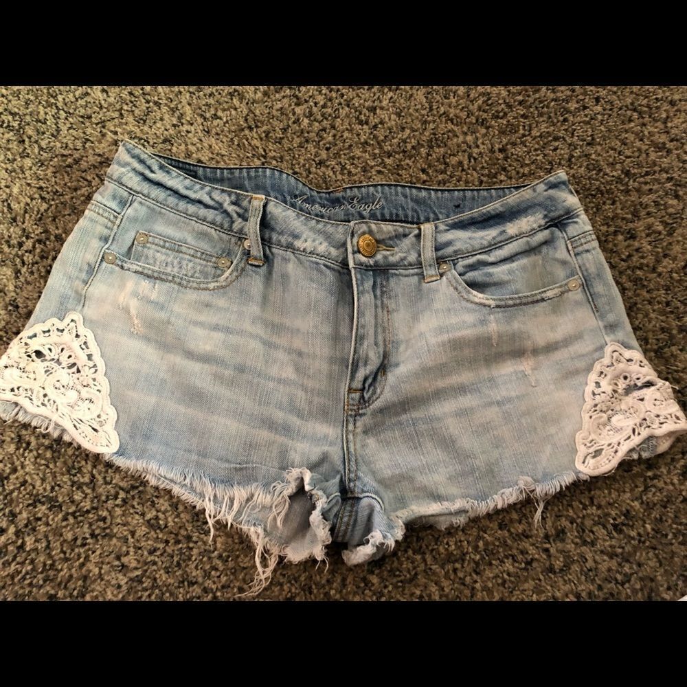 Vintage American Eagle denim cut off shorts with lace cut out sides size 12.
